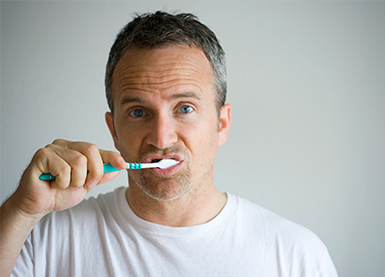 Man brushing teeth - slideshow